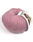Close-up of BeMe Dusty Rose yarn texture, 100% Peruvian wool