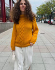 Knitted sweater. Cable knit sweater.