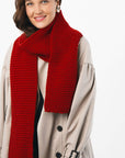 BeMe Cardinal Red wool yarn next to other shades of The Woolcatcher collection