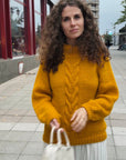 Knitted sweater. Cable knit sweater.